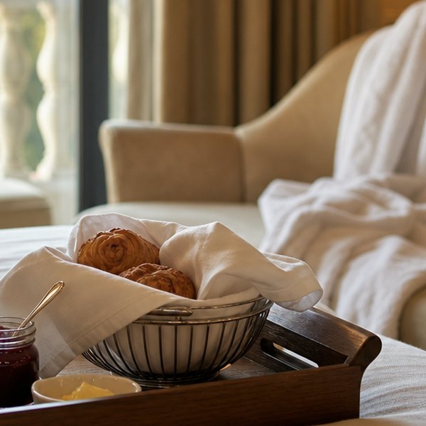Baby examining luxury resort accommodations — detail